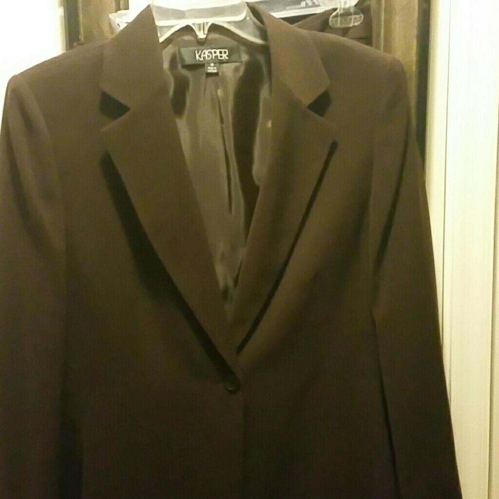 Dark brown suit with pants.